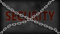 Word 'security' in red on a black background with chains crossed on it