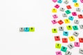 Word SEO written with colorful rubber alphabets on white isolated background