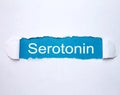 Word Serotonin on torn paper Royalty Free Stock Photo