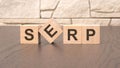 word SERP block wood on wooden table background