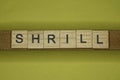 Word shrill made from wooden letters