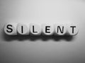 Word silent on wooden dice Royalty Free Stock Photo
