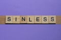 Word sinless made from wooden gray letters