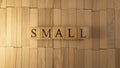 The word small created from wooden cubes.
