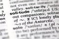 The word solitude in a dictionary Royalty Free Stock Photo