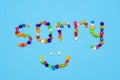The word sorry - the inscription of colored stones pebbles