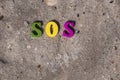 Word sos from wooden letters Royalty Free Stock Photo