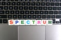 Word Spectrum on keyboard background