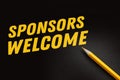 Word SPONSOR WELCOME written on a blackboard with yellow pencil. Fundraising financing sponsorship concept Royalty Free Stock Photo