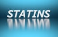 Word Statins on blue background Royalty Free Stock Photo