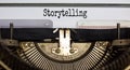 Word `storytelling` typed on retro typewriter. Business concept Royalty Free Stock Photo