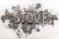 Word stove concept written in burn out ash, dirt, dust Royalty Free Stock Photo