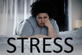 Word STRESS and overweight woman suffering from depression