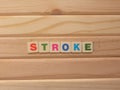 Word Stroke on wood