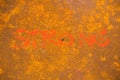 Word strong painted on background with rust on steel