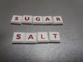 The word sugar and salt made from crossword tiles