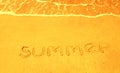 Word Summer written on the sand beach Royalty Free Stock Photo