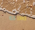 The word summer written in sea sand. Warm sunset time, vacation and enjoyment Royalty Free Stock Photo