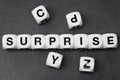 Word surprise on toy cubes Royalty Free Stock Photo