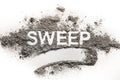 Word sweep written in accumulated pile of dirt, filth, dust, ash Royalty Free Stock Photo