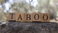 The word TABOO was created from wooden blocks. Sociology and life. Royalty Free Stock Photo