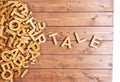 Word tale made with wooden letters