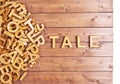 Word tale made with wooden letters