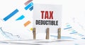 Word TAX DEDUCTIBLE made with wood building blocks Royalty Free Stock Photo