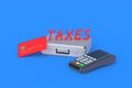 Word taxes near metal suitcase and cash register, plastic card on blue background Royalty Free Stock Photo