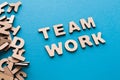 Word Teamwork on blue background Royalty Free Stock Photo