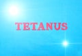 Word tetanus in red letters on a blue background. The concept of a deadly disease of the neural system with convulsions. Treatment