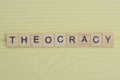 the word theocracy of gray small wooden letters Royalty Free Stock Photo