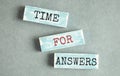 Word TIME FOR ANSWERS made with wood