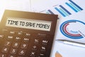 Word TIME TO SAVE MONEY on calculator. Business and finance concept Royalty Free Stock Photo