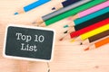 Word TOP 10 LIST written on wooden signage Royalty Free Stock Photo