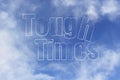 Word `Tough Times` from clouds in a blue sky Royalty Free Stock Photo