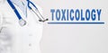 Word - Toxicology on a white background. Medical concept
