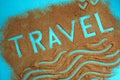 The word travel is written on the sand Royalty Free Stock Photo