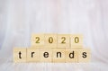 The word trends and 2020 on wooden cube block. 2020 trend concept Royalty Free Stock Photo