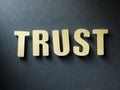 The word Trust on paper background Royalty Free Stock Photo