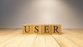 The word user was created from wooden cubes. Technology and life