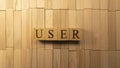 The word user was created from wooden cubes. Technology and life