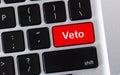 Word Veto written on red button of computer keyboard. Royalty Free Stock Photo