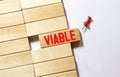 word Viable on wooden block. wooden background