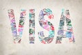 Word visa created with passport stamps