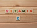 Word Vitamin C on wood