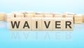 word Waiver made with wood building blocks, business concept Royalty Free Stock Photo