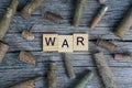 Word war made of wooden letters and old bullets and cartridges