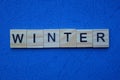 Word winter made from brown wooden letters