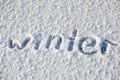 Word `winter` written on snow